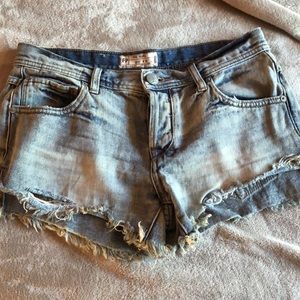 Free People light wash cutoff shorts